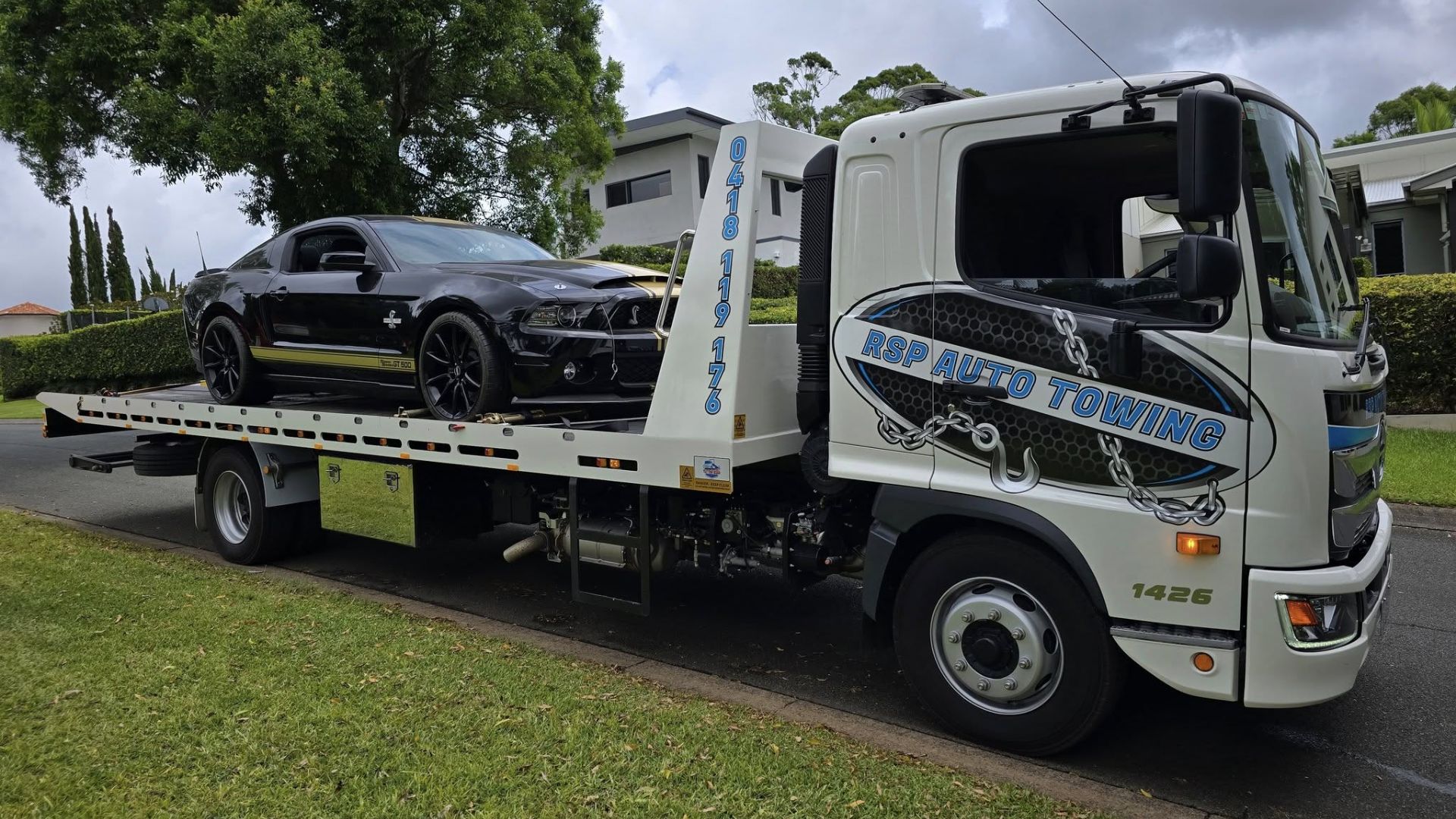 RSP Auto Towing truck with a black GT on top